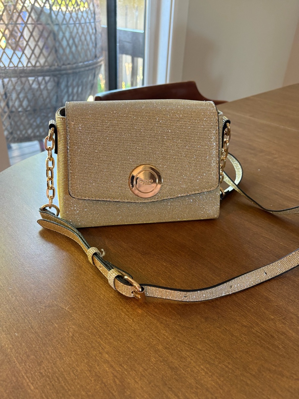 Glittery gold crossbody Dune London bag